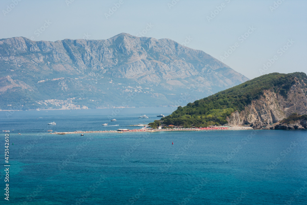 Hawaii beach, seafront view at St. Nicholas Island in Adriatic Sea near town Budva, Montenegro, Europe
