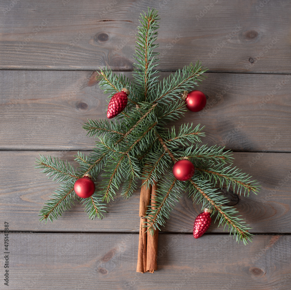Christmas tree concept. Creative winter layout made with evergreen tree branches. Flat lay. Christmas tree concept. Creative winter layout made with evergreen tree branches. Flat lay.
