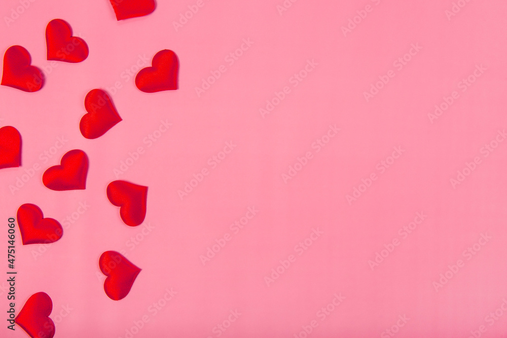Valentines day background with red hearts on a pink background, free space for text Valentines day background with red hearts on a pink background, free space for text