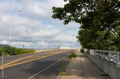 Empty Road and Sidewalk leading to a Bridge in New Haven Connecticut