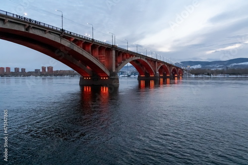 Communal Bridge (1961) with night illumination across the Yenisei River in the city of Krasnoyarsk. Russia. © papava