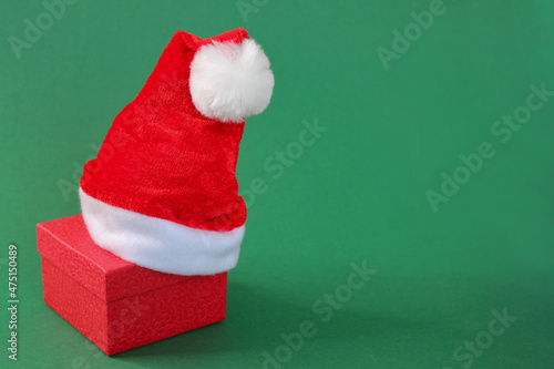 Santa Claus hat on a gift box. Merry Christmas.Happy