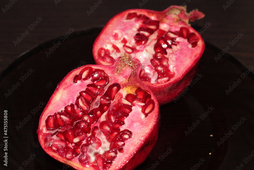 Fototapeta premium pomegranate on a black background