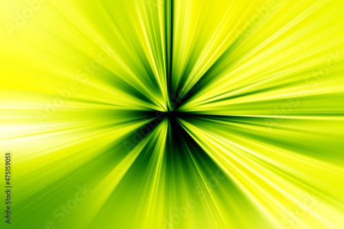 Abstract radial zoom blur surface of green and yellow tones. Bright colorful background with radial, radiating, converging lines. 