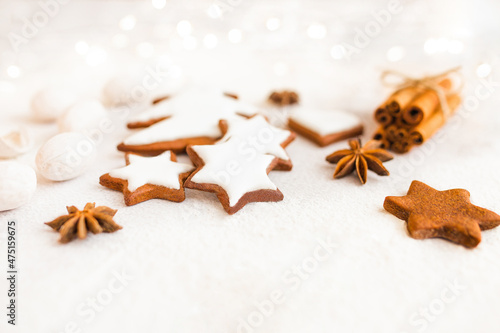 Baking Christmas gingerbread with white decor. Preparing homemade gingerbread for the holidays.