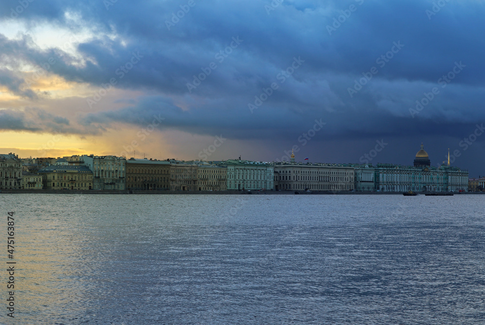 Beautiful landscape with river and old buildings on the embankment in St. Petersburg, Russia. Wonderful view from water of the famous Russian landmarks: the Hermitage, Winter Palace.