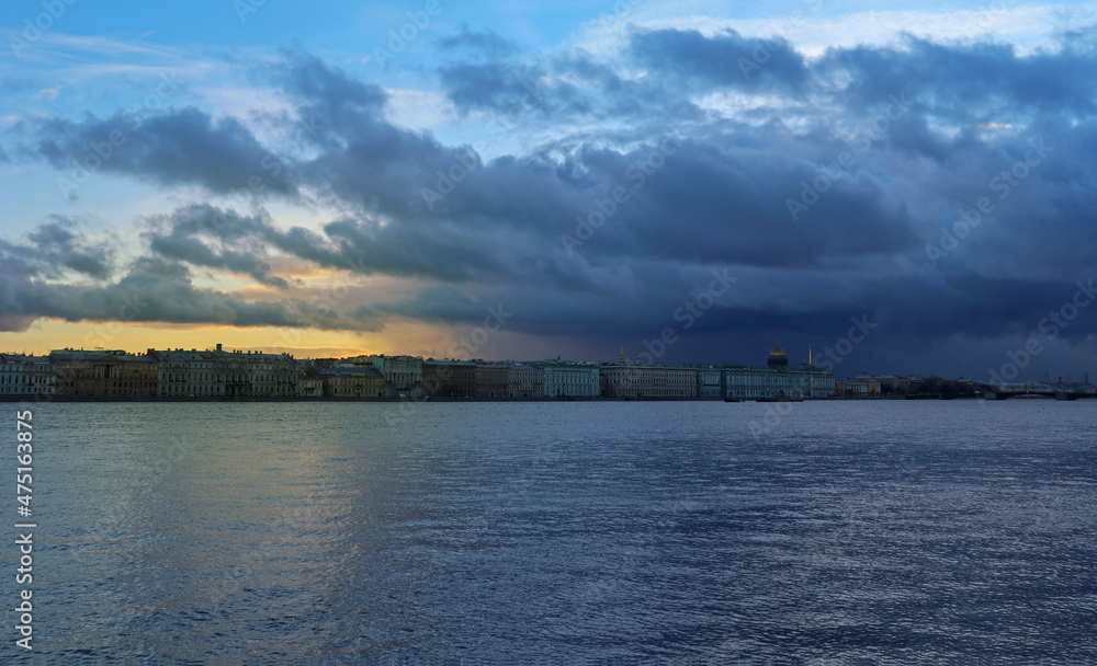 Beautiful landscape with river and old buildings on the embankment in St. Petersburg, Russia. Wonderful view from water of the famous Russian landmarks: the Hermitage, Winter Palace.