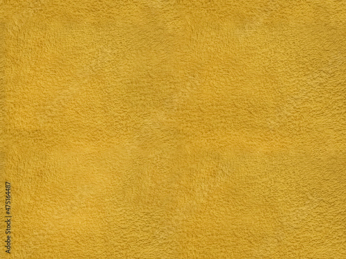terry cloth seamless texture. Yellow seamless fabric background. close-up of towel material for backdrop