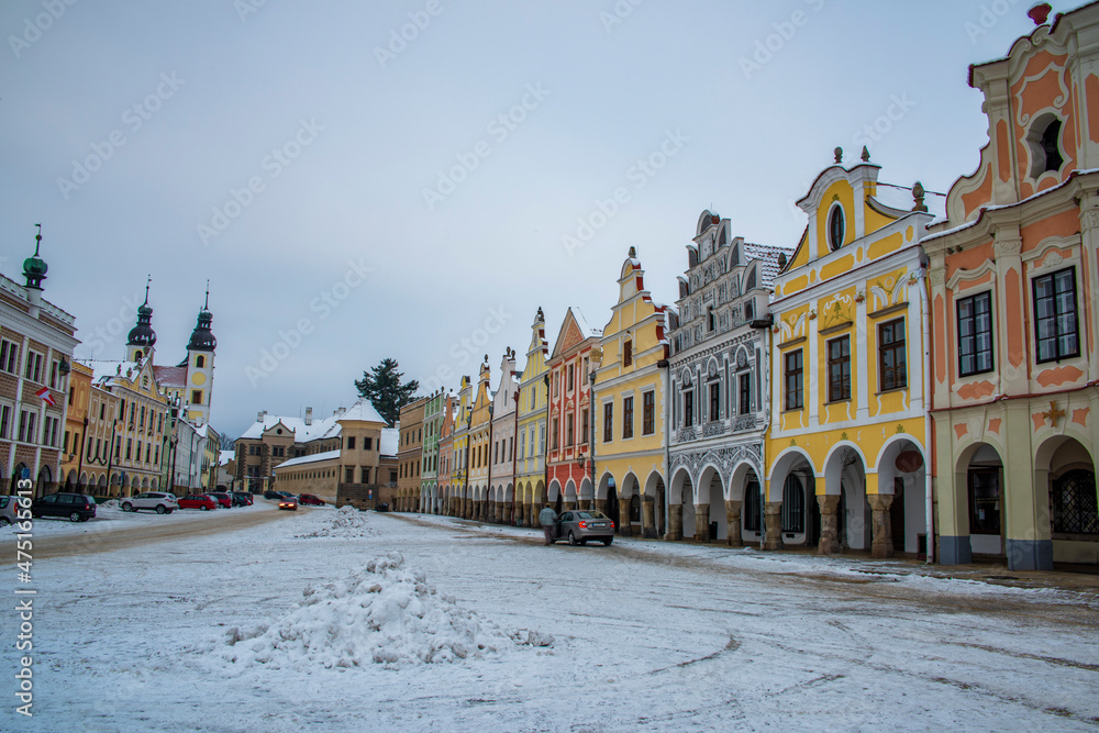 Square in old Telc town in winter dark cold morning