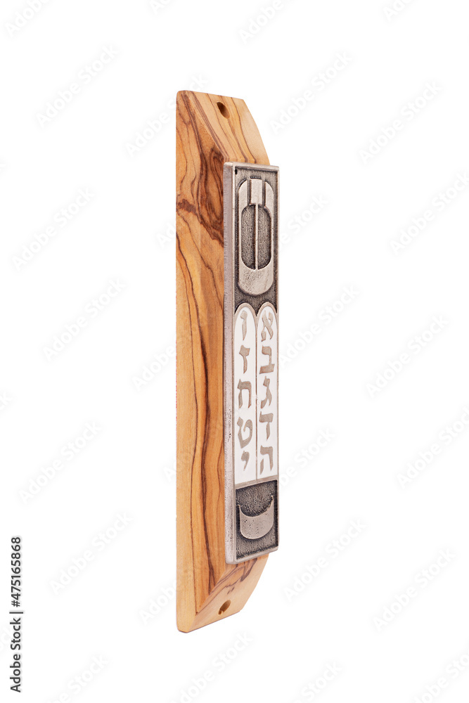 A Jewish Wooden Mezuzah contains specific Torah verses and is placed on