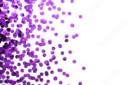 Purple round confetti on white background. Festive day backdrop. Flat lay style with minimalistic design. Template for banner or party invitation