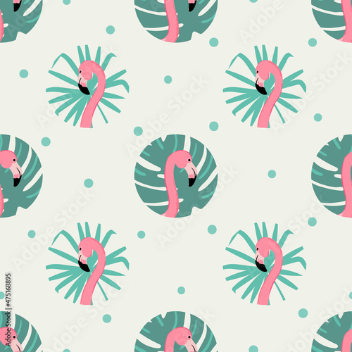 Seamless polka dot pattern with pink flamingo. Vector tropical print.	