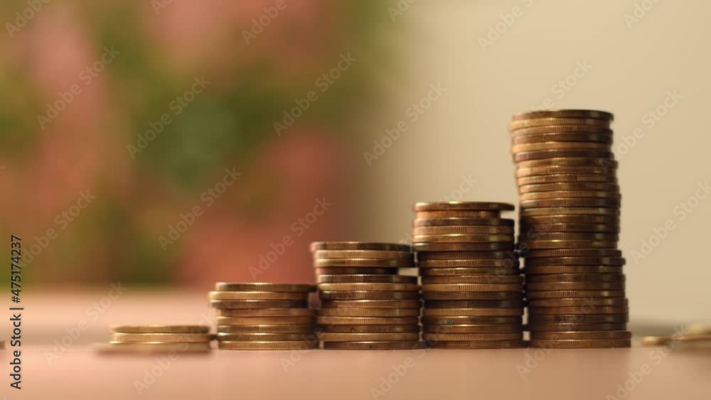 Coin stack on the desk, money saving concept with selective focus Coin stack on the desk, money saving concept with selective focus