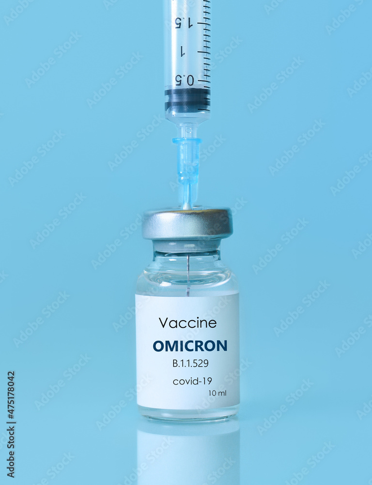 Bottle of Covid-19 vaccine to immunize from the Omicron Variant Coronavirus. The concept of medicine, healthcare and science.Copy space for text. Bottle of Covid-19 vaccine to immunize from the Omicron Variant Coronavirus. The concept of medicine, healthcare and science.Copy space for text.