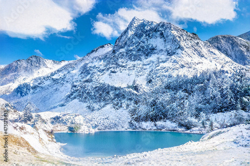 Paysage de montagne recouvert de neige dans le massif du parc du Mercantour dans les Alpes du Sud avec un lac d'altitude © Bernard