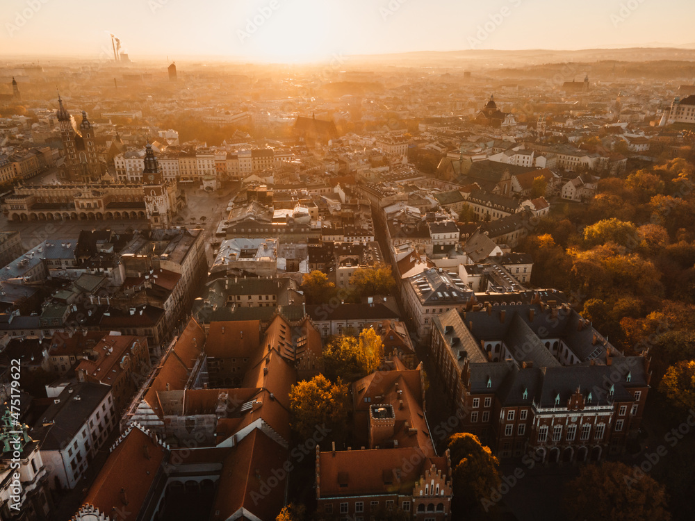Sunrise view on Cracow main square and streets. Cracow, Lesser Poland province. St. Mary's Basilica, Rynek Glowny, Wawel castle - obrazy, fototapety, plakaty 