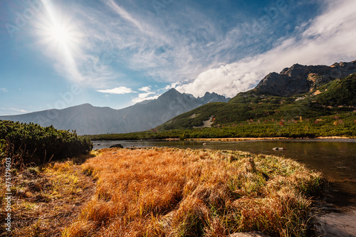 Hiking in national park High Tatras. HiIking to biele pleso near zelene pleso in the mountain Vysoke Tatry, Slovakia. Beautiful photo