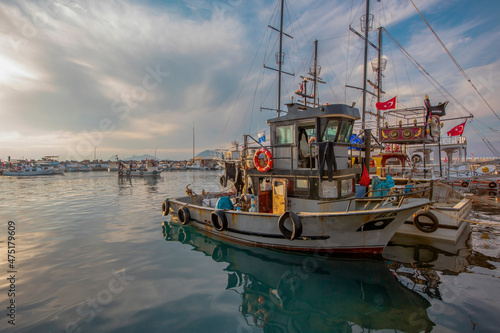 Turgutreis - Bodrum- Muğla-Turkey - November 15, 2021: Turgutreiste, one of the most popular touristic places of the Aegean region, is the harbor with fishing boats.