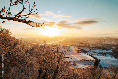 Vienna in Austria during winter. Sunrise morning view to the snow covered city.