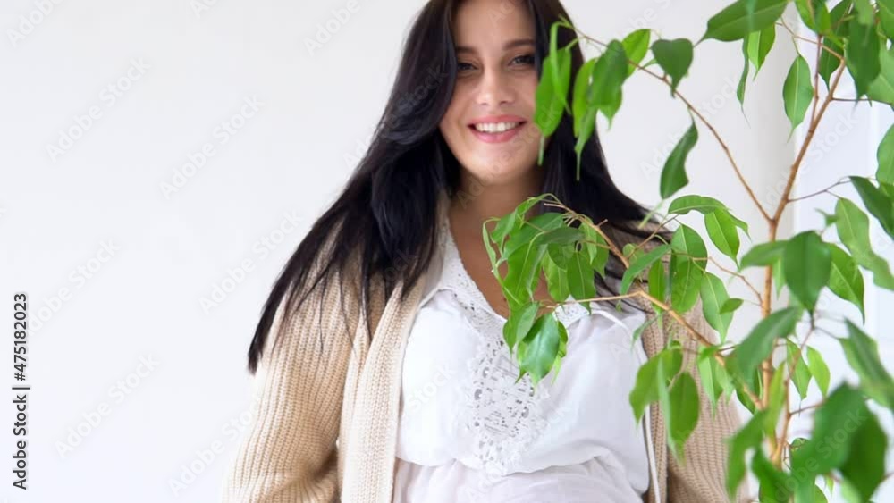 beautiful pregnant woman before giving birth in a white room beautiful pregnant woman before giving birth in a white room