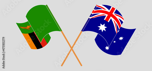 Crossed and waving flags of Zambia and Australia