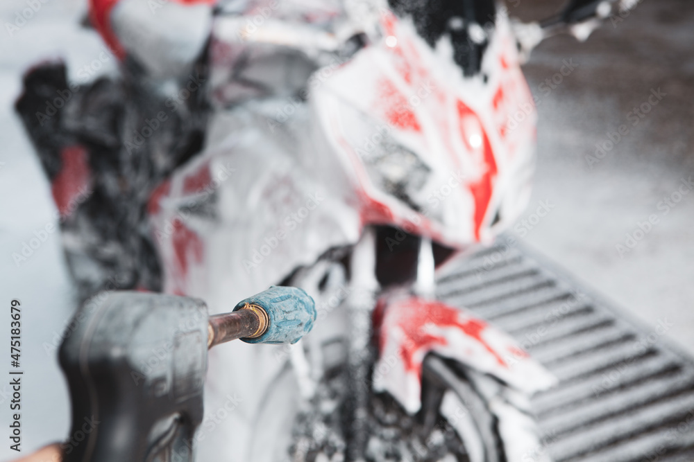 Obraz premium motorcycle wash. motorcycle and foam