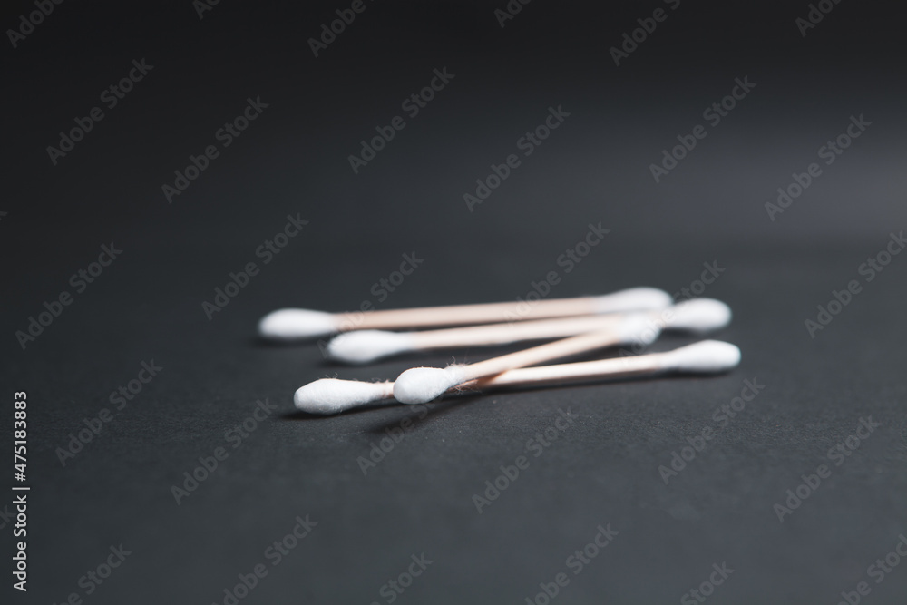 cotton swabs on a dark background cotton swabs on a dark background