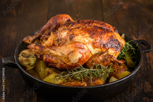 Roasted chicken with potatoes and onions