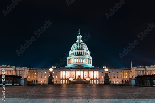 Front view of the Capitol dome building at night, Washington DC, USA. Illuminated Home of Congress and Capitol Hill. The concept of legislative branch of American political system