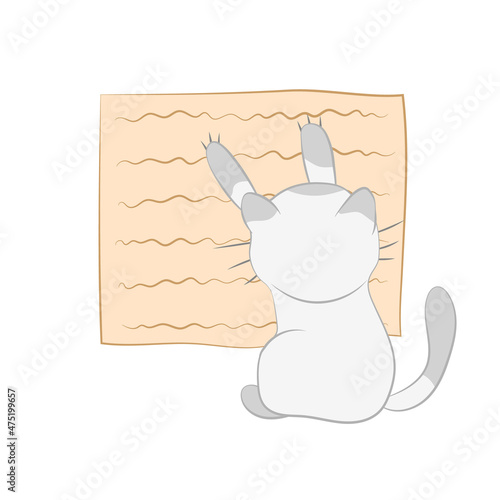 a kitten who sharpens claws on a scratching post