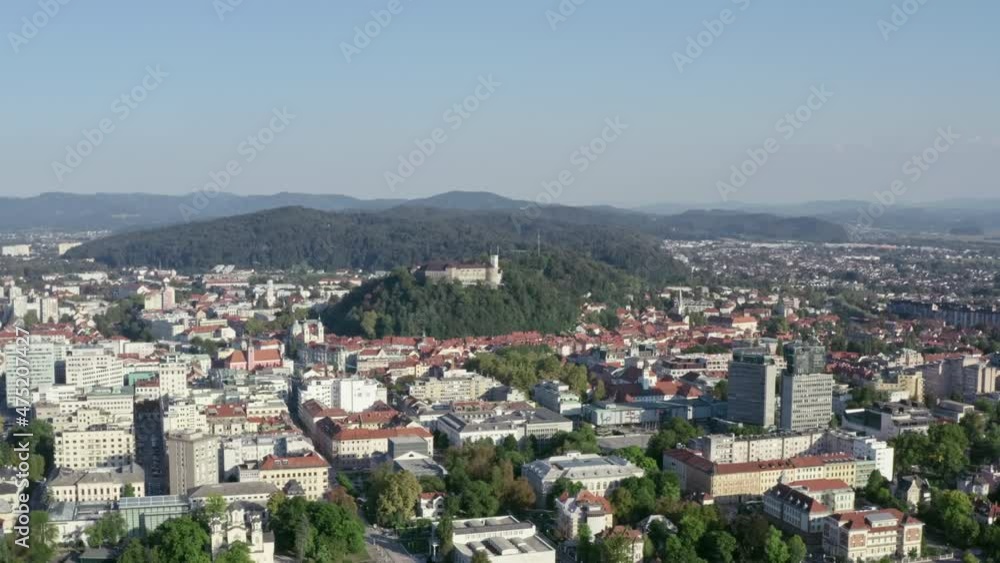Aerial view cityscape of Ljubljana. Old town with a castle on the mountain, historic streets with houses and ancient architecture in the capital of Slovenia. Aerial view cityscape of Ljubljana. Old town with a castle on the mountain, historic streets with houses and ancient architecture in the capital of Slovenia.