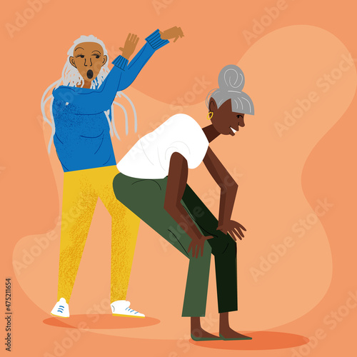 Older lesbian couple dancing and having fun