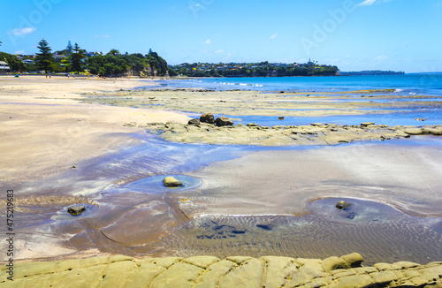 Landscape View of Mairangi Bay Beach Auckland, New Zealand photo