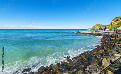 Obraz na płótnie Panoramic View of St Clair Beach Dunedin, South Island New Zealand; Rocky Part of the Beach during High Tide with Rough Seas w salonie