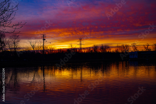 Copper-colored sunrise over small pond in Chardon  Ohio