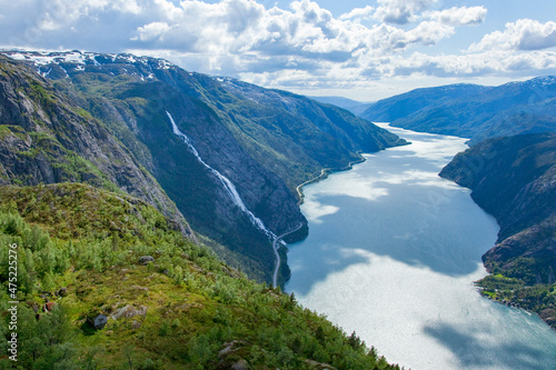 Landscape of the Langfoss waterfall and mountains in Akrafjorden, Norway photo