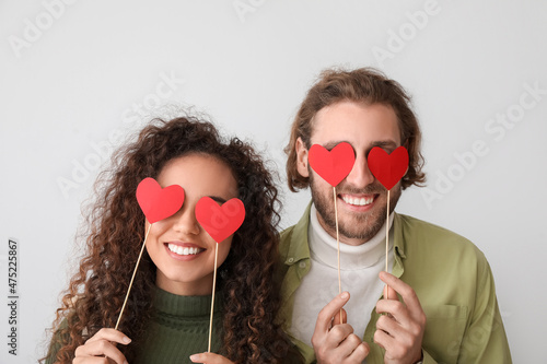 Happy young couple with par...