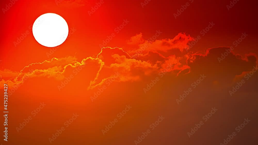 sunset timelapse, bright sun globe hiding behind clouds. warm orange sky sunset timelapse, bright sun globe hiding behind clouds. warm orange sky