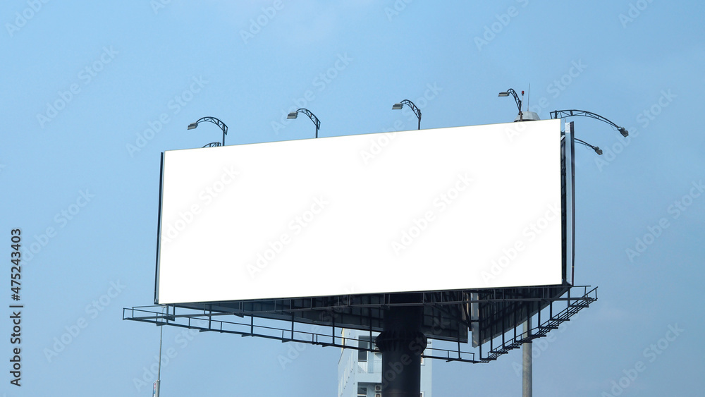 Blank billboard large size for outdoor or out of home advertising with blue sky. Blank billboard large size for outdoor or out of home advertising with blue sky.