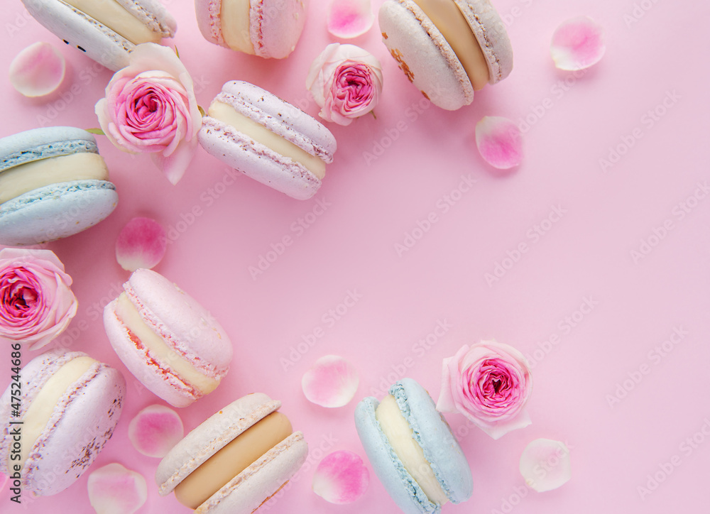 Tasty macaroons with beautiful roses