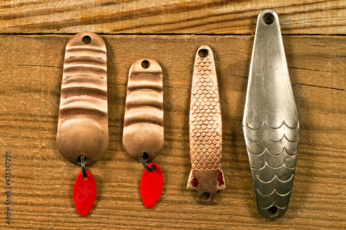 A set of old metal lures for fishing. photo