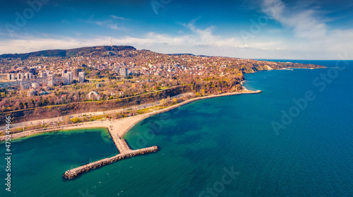 Incredible morning view from flying drone of Varna port. Aerial seascape of Black sea, east coast of Bulgaria, Europe. Traveling concept background.