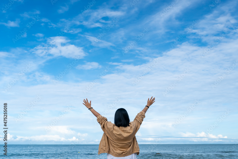 Woman travel around the world with summer beach freedom and relax life.