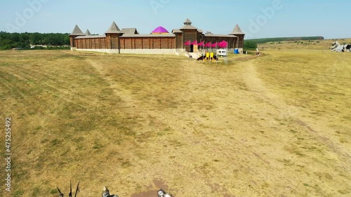 City Zadonsk, Lipetsk region, Russia - August 20, 2021: Aerial view of Old Russian fortress on a hill - an exact copy of the fortresses of the 4th-5th centuries. Safari Park 