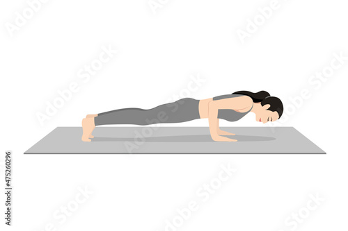 Four Limbed Staff Pose, Four Limbed Stick Pose, Beautiful girl practice Caturanga Dandasana. Young attractive woman practicing yoga exercise. working out, black wearing sportswear, grey pants and top