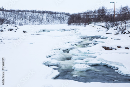 Frozen river in the snow