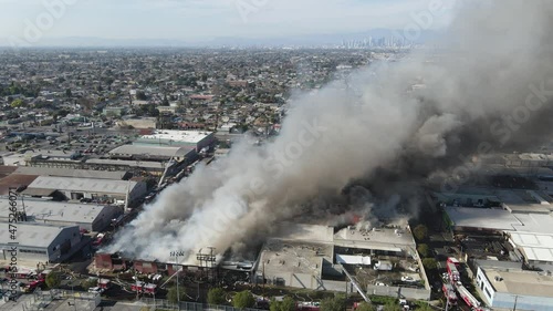 Massive firefight as buildings go up in flames  photo