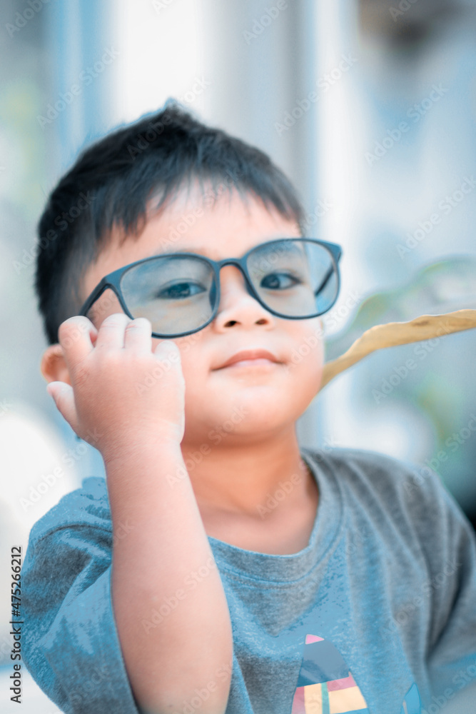 Portrait of little boy with glasses. Portrait of little boy with glasses.