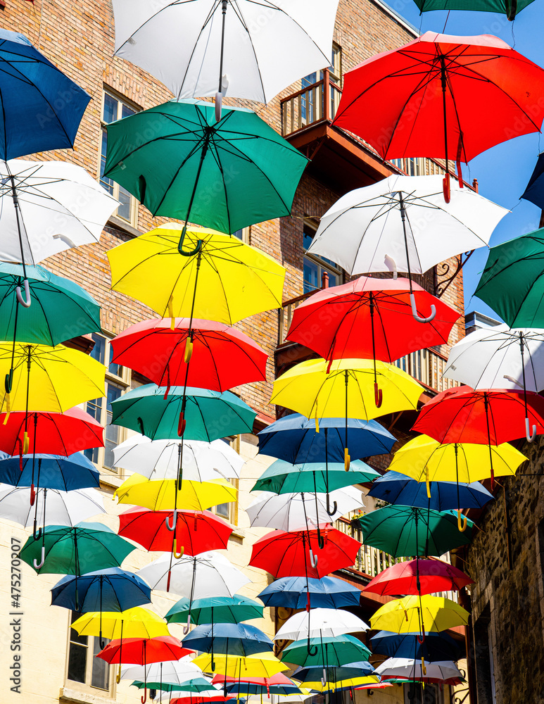 colourful umbrellas hanging over the street