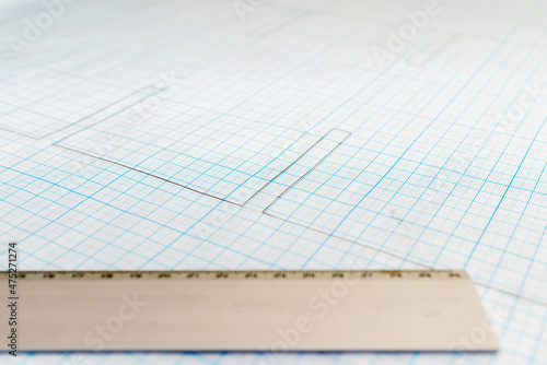 Blueprints and engineer measure supplies on the table.Soft focus.